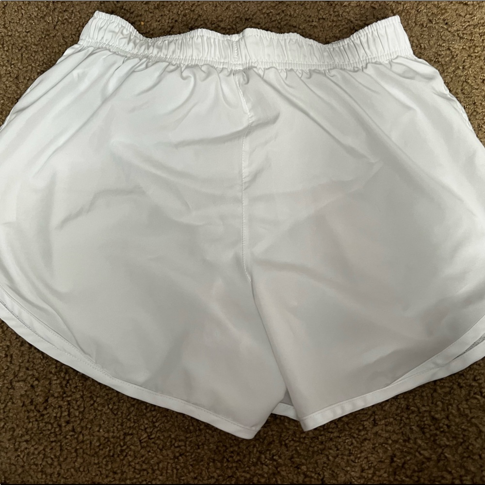 White nike shorts.